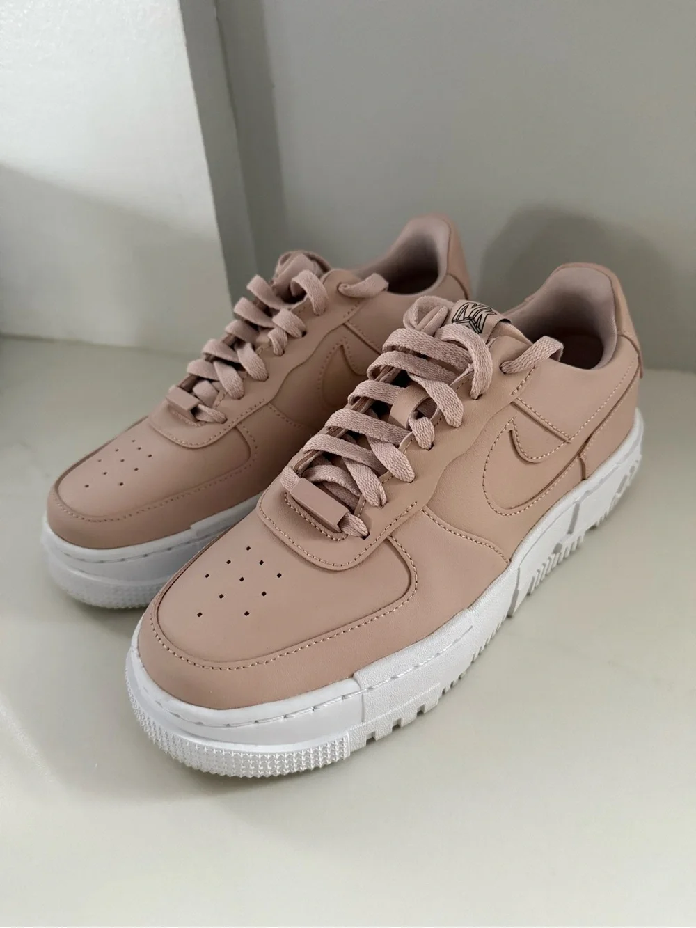 Nike Women’s Blush Leather Low-Top Sneakers